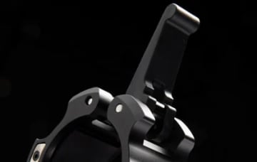 LOCK-OPEN LEVER WITH SNAP FLEXURE