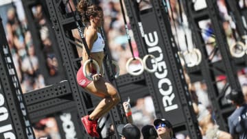 Tia Clair-Toomey performing ring muscle up