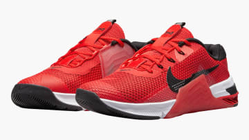 Nike Metcon 7 - Men's - Chile Red / Magic Ember / White / Black angled view on white background
